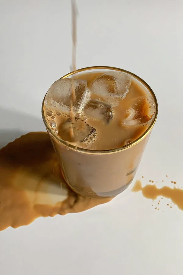 Steam rising from a freshly poured cup of coffee